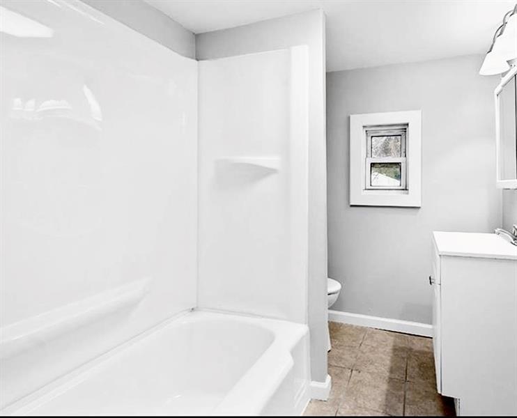 6630 Library Road South Park, PA 15129 - Photo 8 of 21 a bathroom with a bathtub