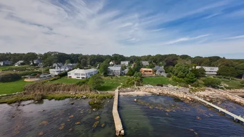 a view of a street with a houses