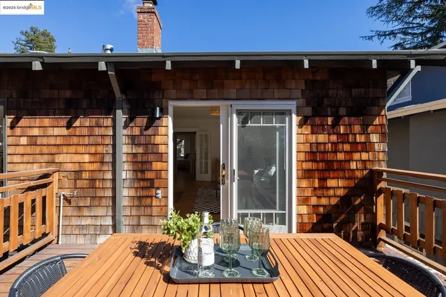 a view of a dining room with furniture and window