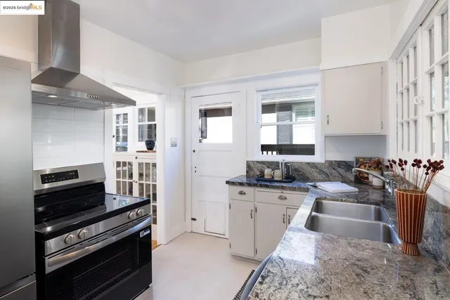 a bathroom with a toilet and a bathtub