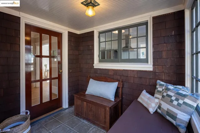 a room with furniture and a large window