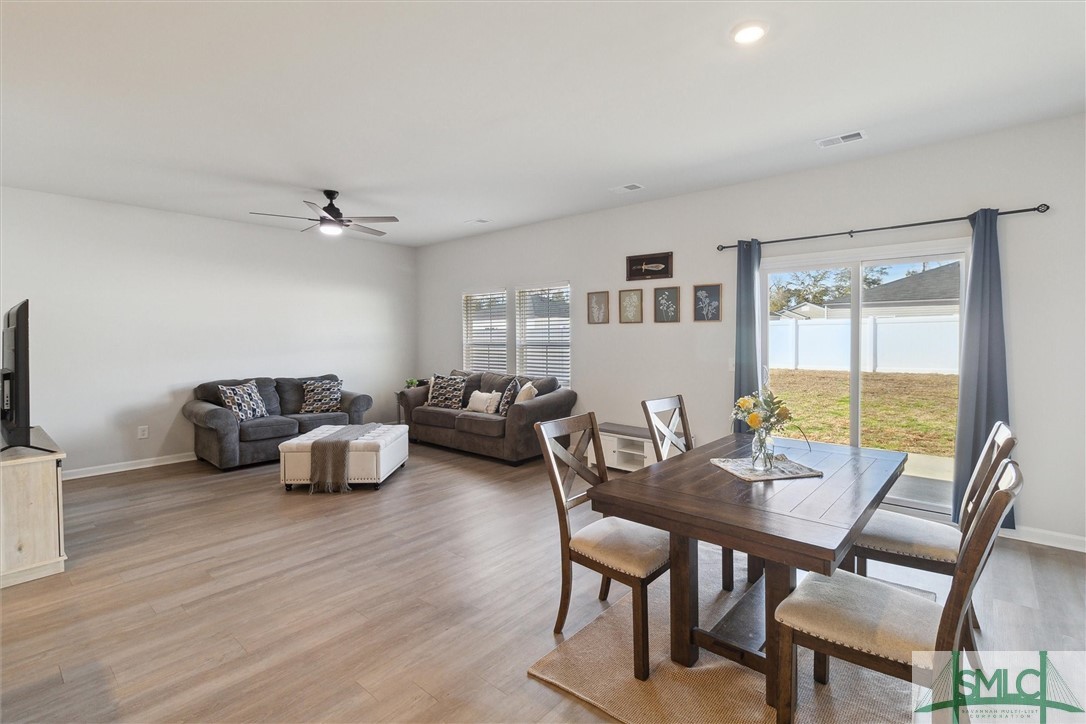 147 Franklins Walk Rincon, GA 31326 - Photo 12 of 38 Great room/dining area