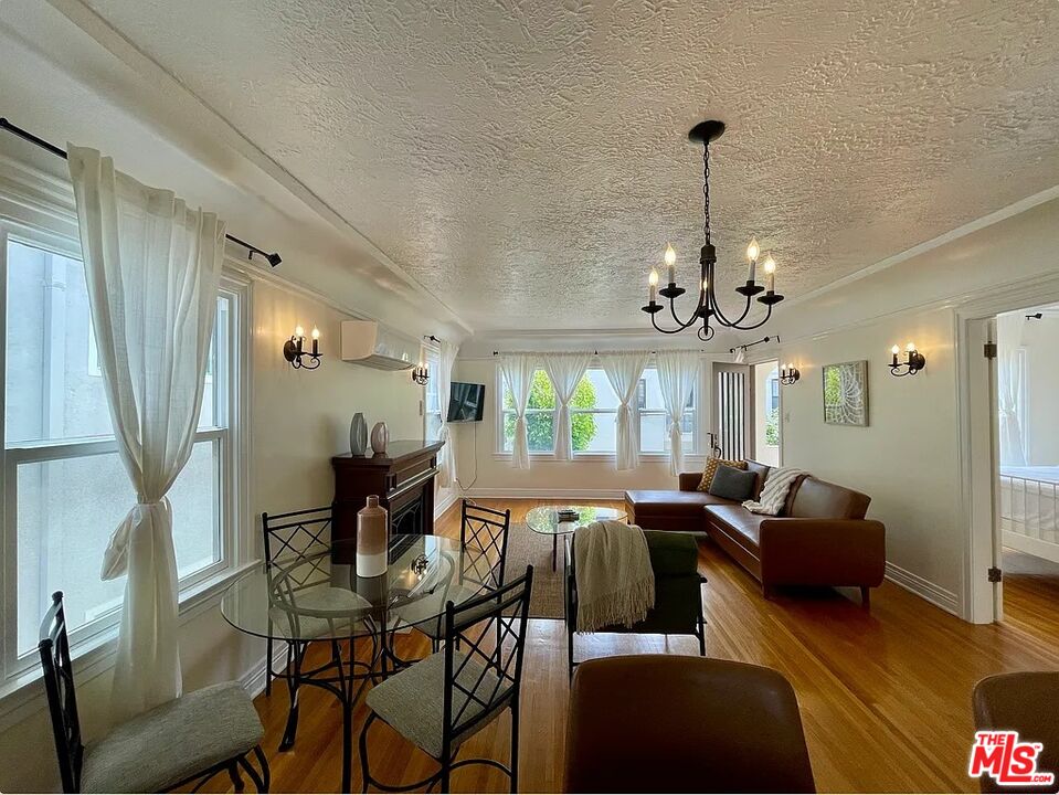 837 5th Street, Unit 839B Santa Monica, CA 90403 - Photo 15 of 23 a view of a dining room with furniture window and outside view