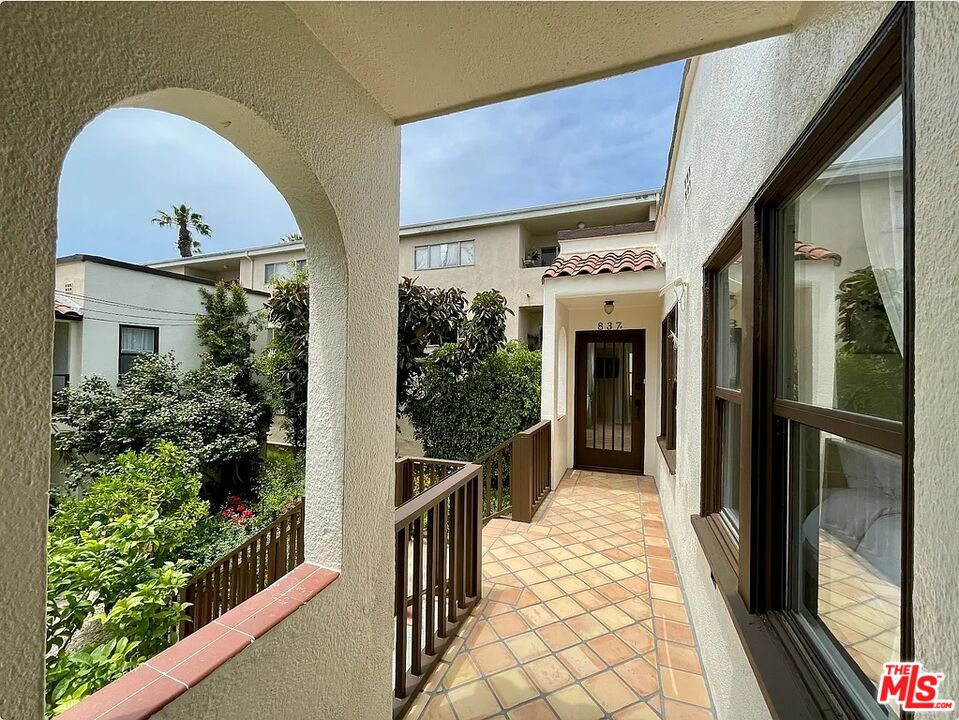 837 5th Street, Unit 839B Santa Monica, CA 90403 - Photo 6 of 23 a front view of a house with a porch