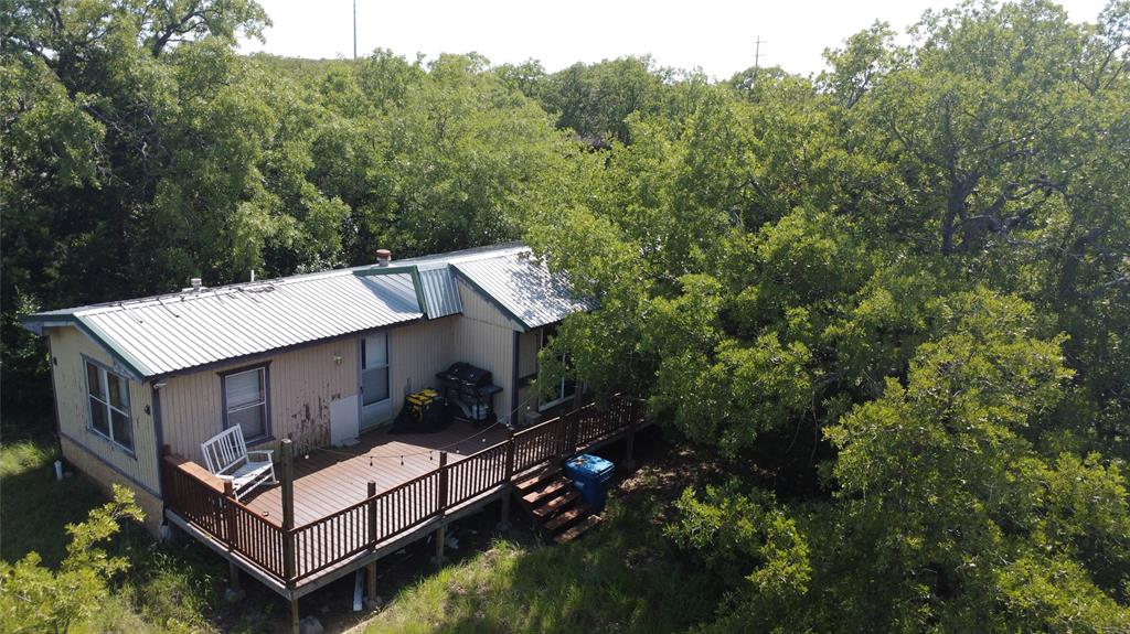 194 Lakeview Court Sunset, TX 76270 - Photo 10 of 19 a view of a couches in the roof deck