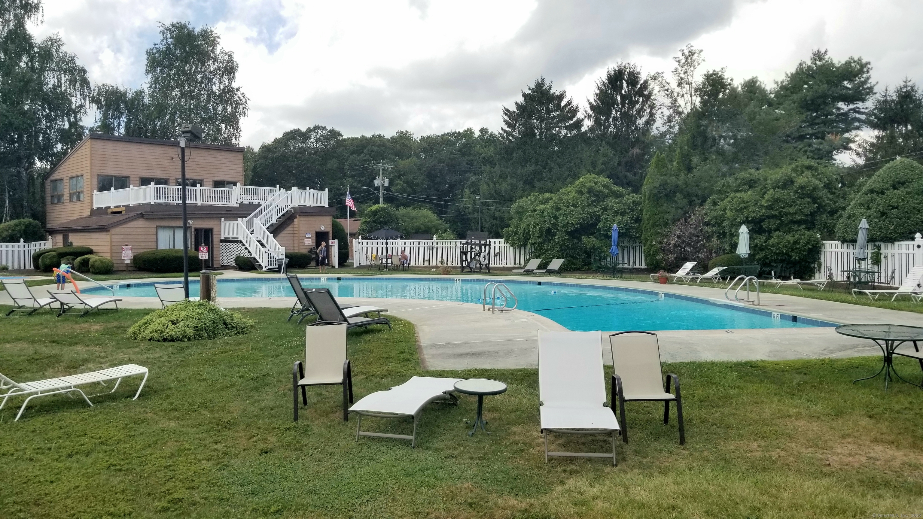 75 Balance Rock Road, Unit 11 Seymour, CT 06483 - Photo 2 of 21 an aerial view of a house with swimming pool and a bench