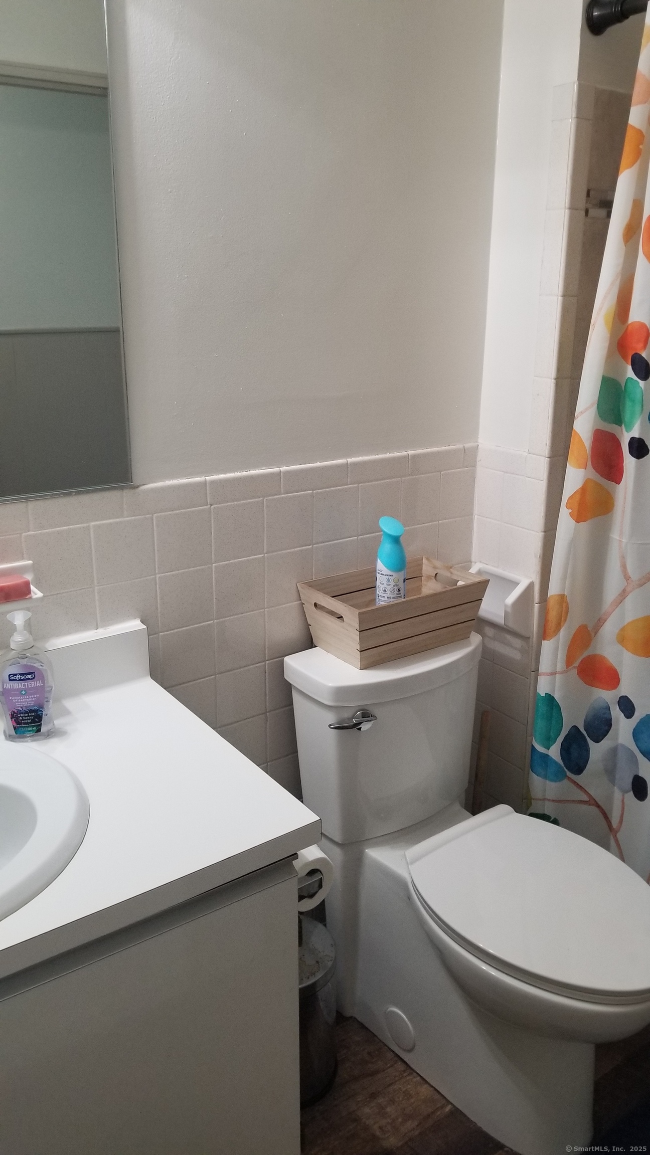 75 Balance Rock Road, Unit 11 Seymour, CT 06483 - Photo 21 of 21 a white toilet sitting next to a bathroom sink