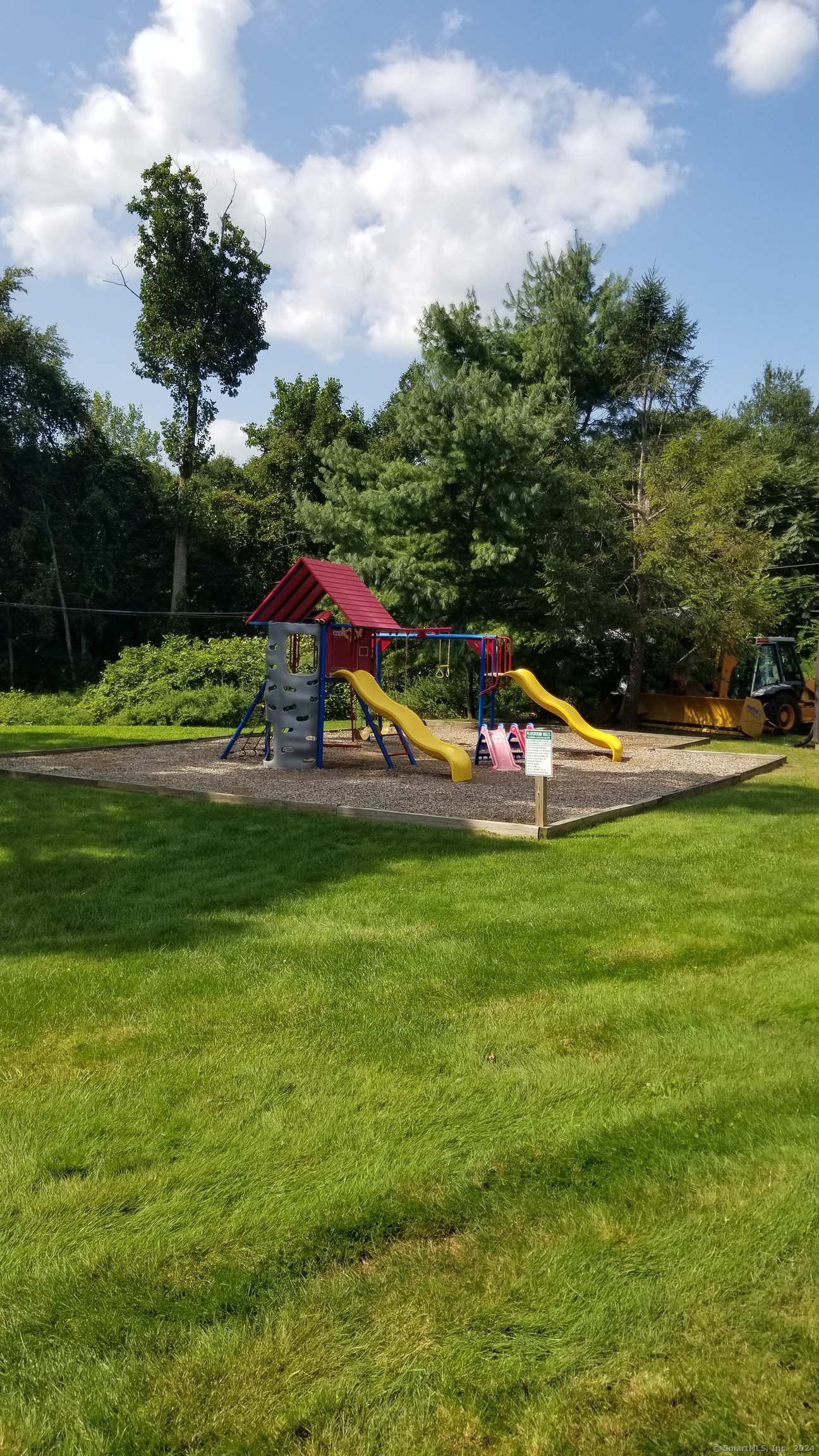 75 Balance Rock Road, Unit 11 Seymour, CT 06483 - Photo 4 of 21 a view of outdoor space with playground and green space