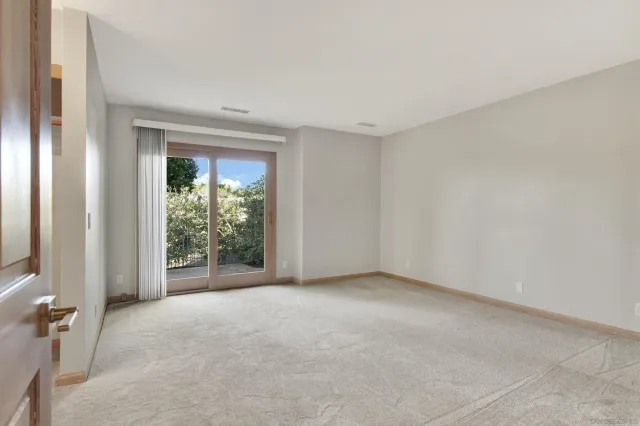 a view of a house with pool and sitting area