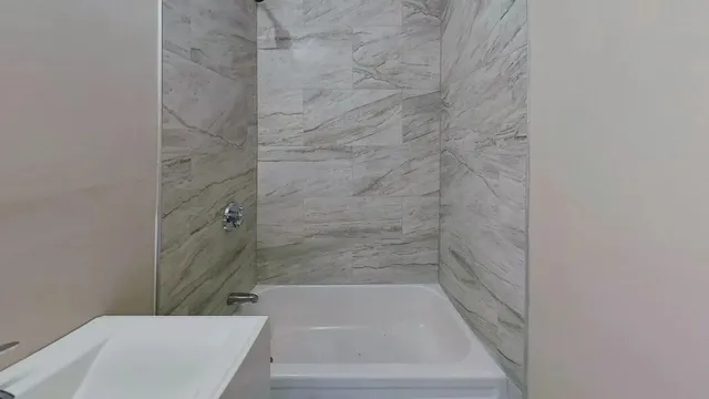a bathroom with a bathtub