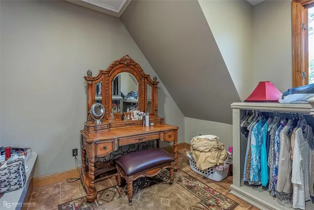 a view of bedroom with furniture and toys