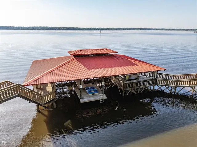 a front view of a house with roof deck
