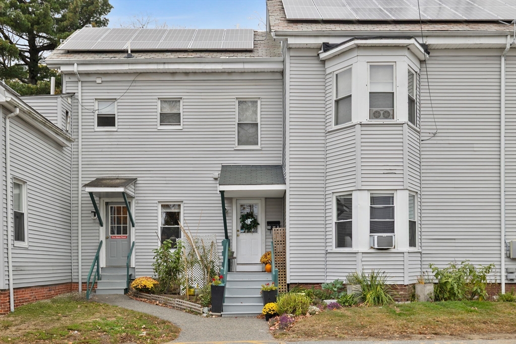 33 Clinton Street Framingham, MA 01702 - Photo 21 of 26 a view of a house with more windows and plants