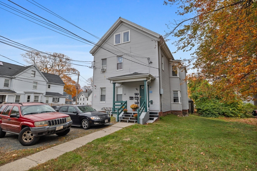 33 Clinton Street Framingham, MA 01702 - Photo 22 of 26 a view of a cars in front of a house
