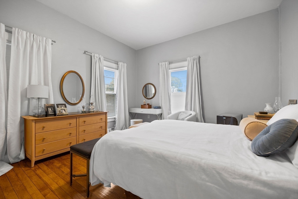 33 Clinton Street Framingham, MA 01702 - Photo 6 of 26 a bedroom with a bed and a dresser