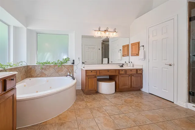 a view of a hallway with windows