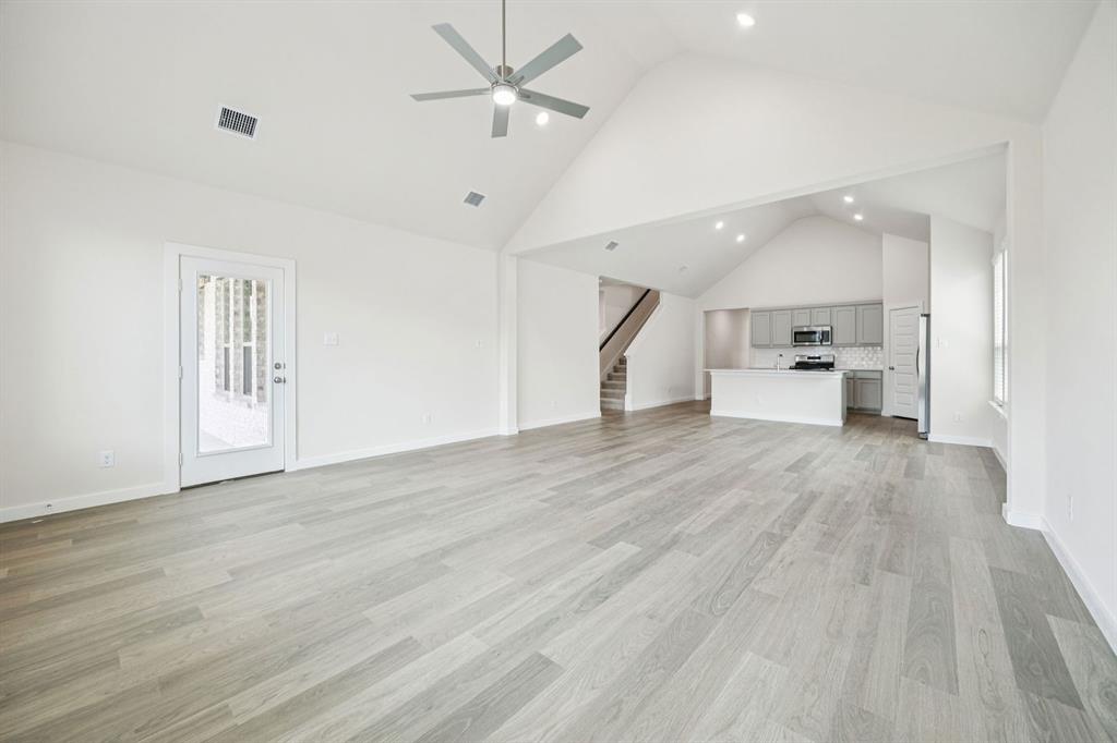 483 Sierra Ridge Lavon, TX 75166 - Photo 11 of 29 a view of empty room with wooden floor