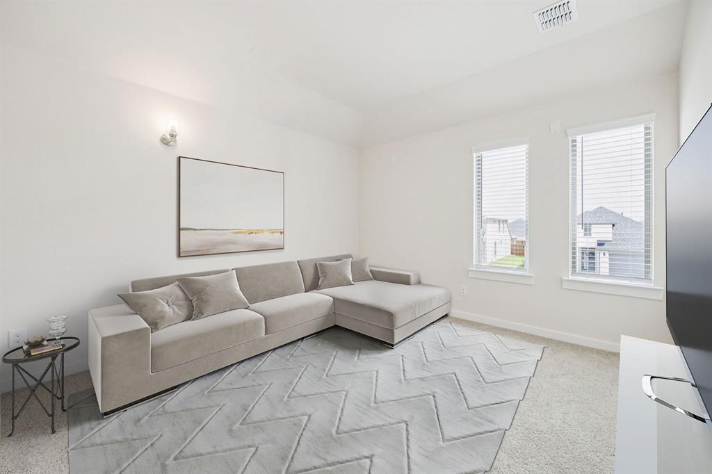 483 Sierra Ridge Lavon, TX 75166 - Photo 22 of 29 a living room with furniture and a window