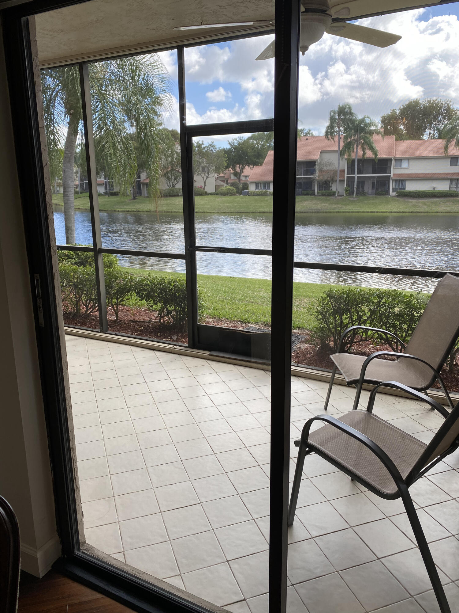 5621 Coach House Circle, Unit D Boca Raton, FL 33486 - Photo 25 of 29 a view of a street from a window