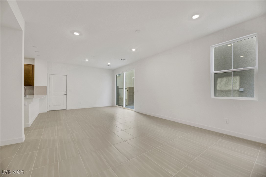 2770 Alfena Place Henderson, NV 89044 - Photo 10 of 26 Unfurnished room with recessed lighting and light tile patterned floors
