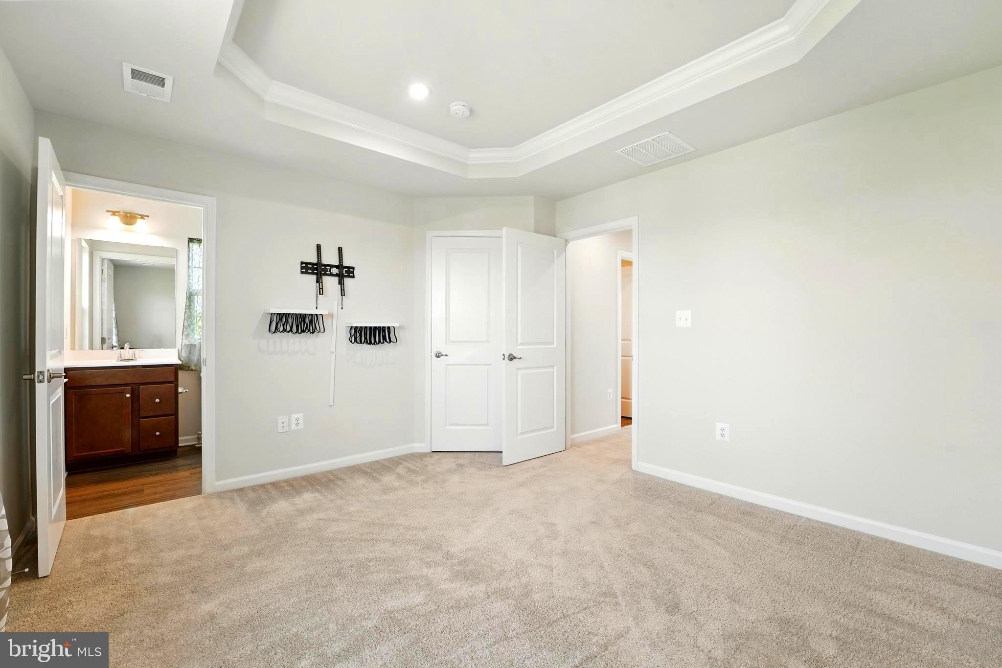1754 Scenic Loop Culpeper, VA 22701 - Photo 16 of 39 an empty room with kitchen and mirror