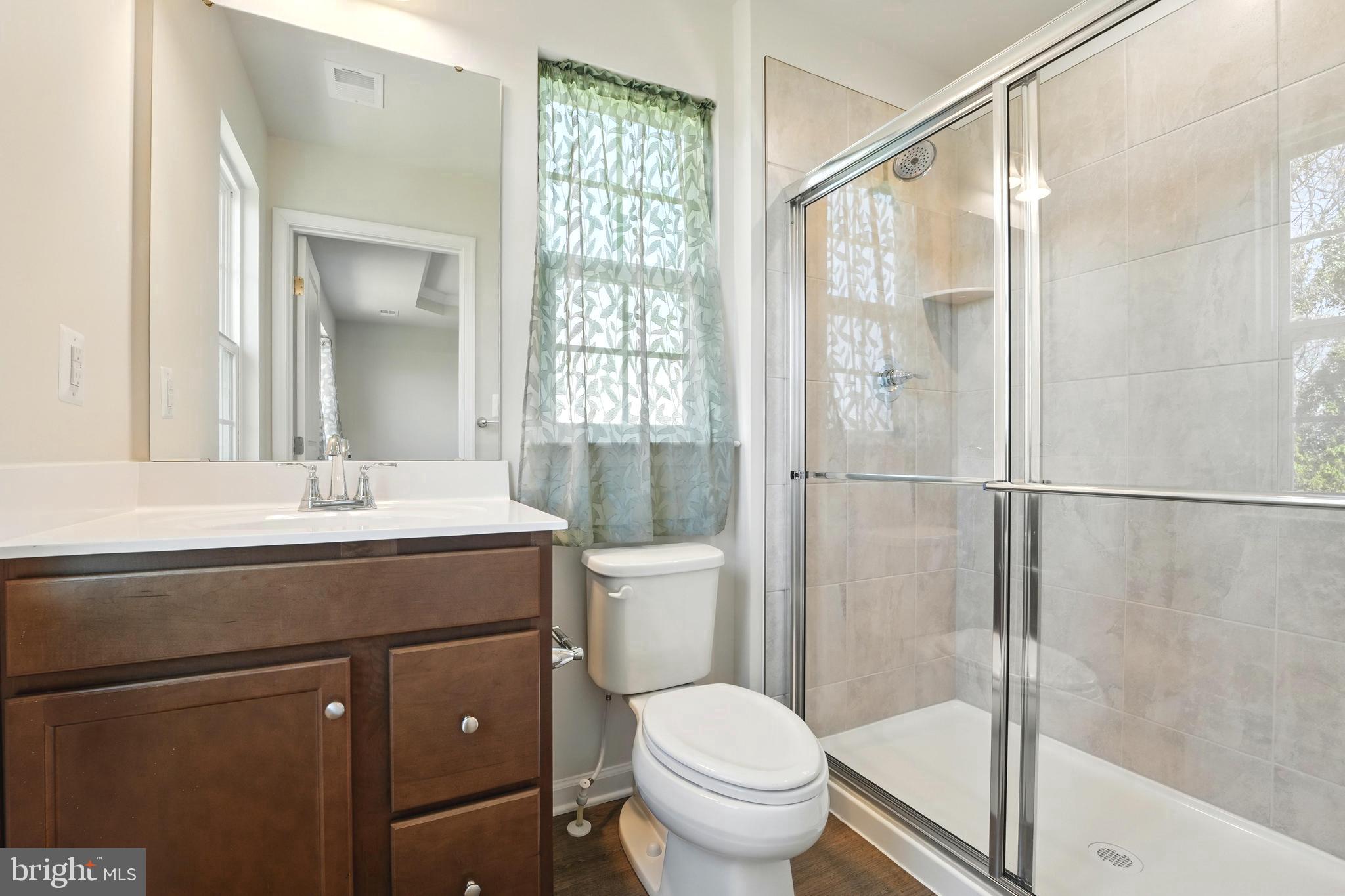 1754 Scenic Loop Culpeper, VA 22701 - Photo 17 of 39 a bathroom with a sink toilet and shower