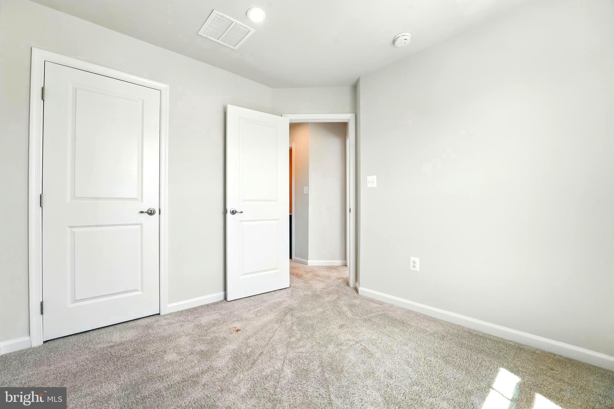 1754 Scenic Loop Culpeper, VA 22701 - Photo 23 of 39 an empty room with a door