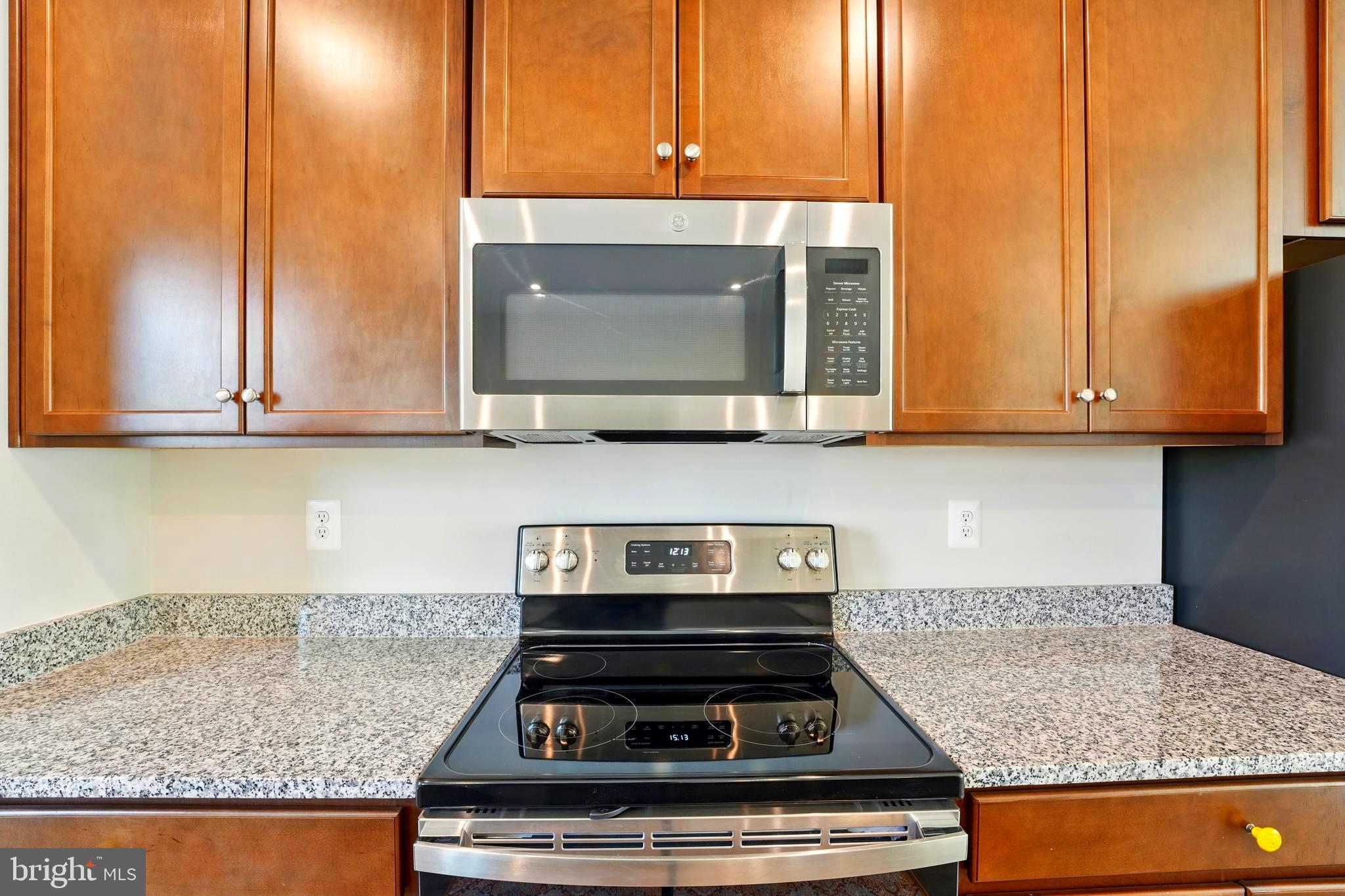 1754 Scenic Loop Culpeper, VA 22701 - Photo 7 of 39 a stove top oven sitting inside of a kitchen