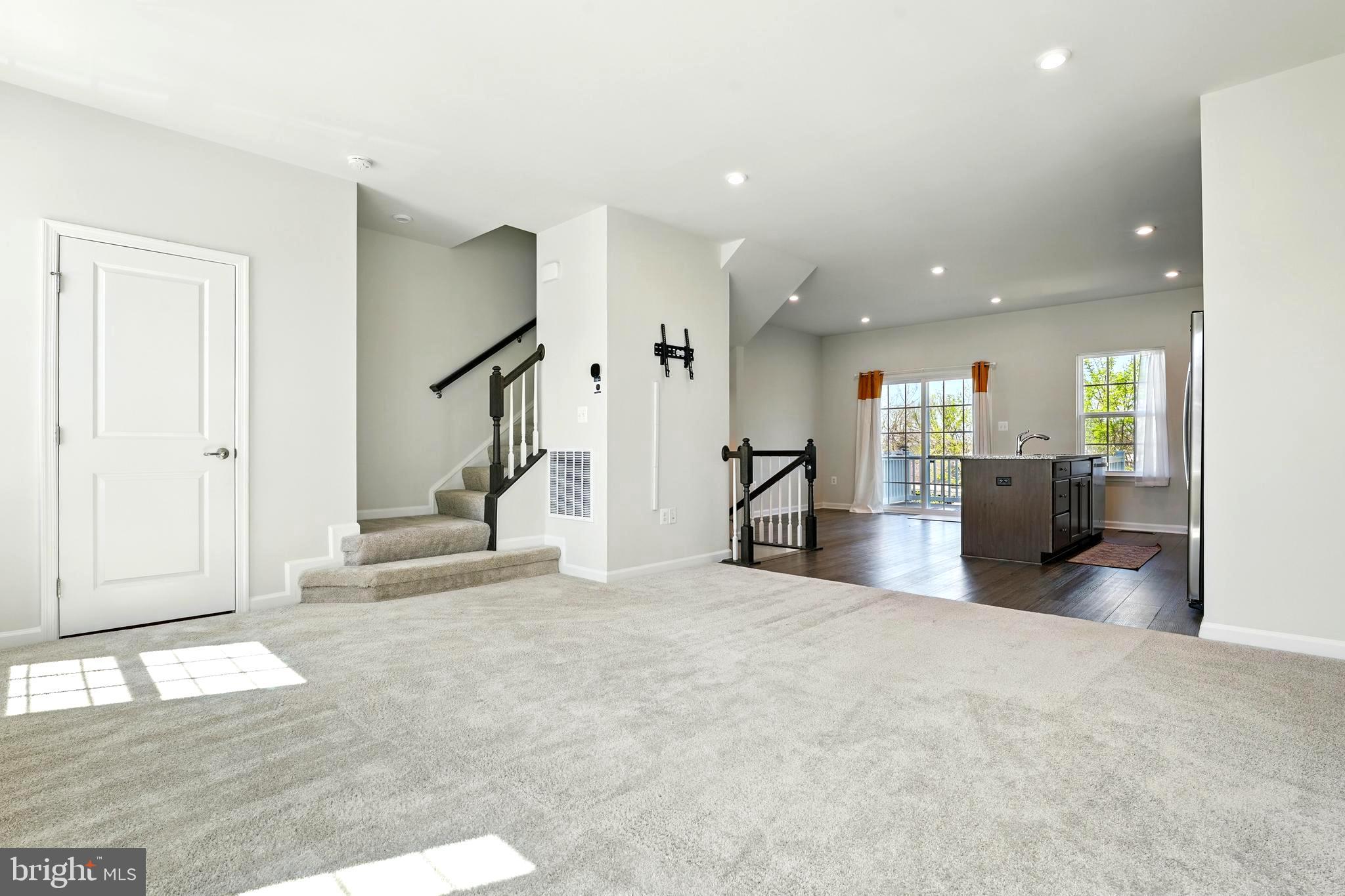 1754 Scenic Loop Culpeper, VA 22701 - Photo 10 of 39 a view of an empty room with a fireplace and a window