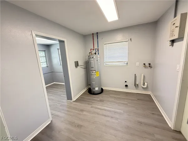 a view of a livingroom with wooden floor