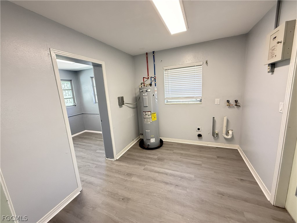 1534 Ricardo Avenue Fort Myers, FL 33901 - Photo 13 of 22 a view of a livingroom with wooden floor