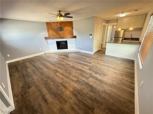 a view of a livingroom with a furniture