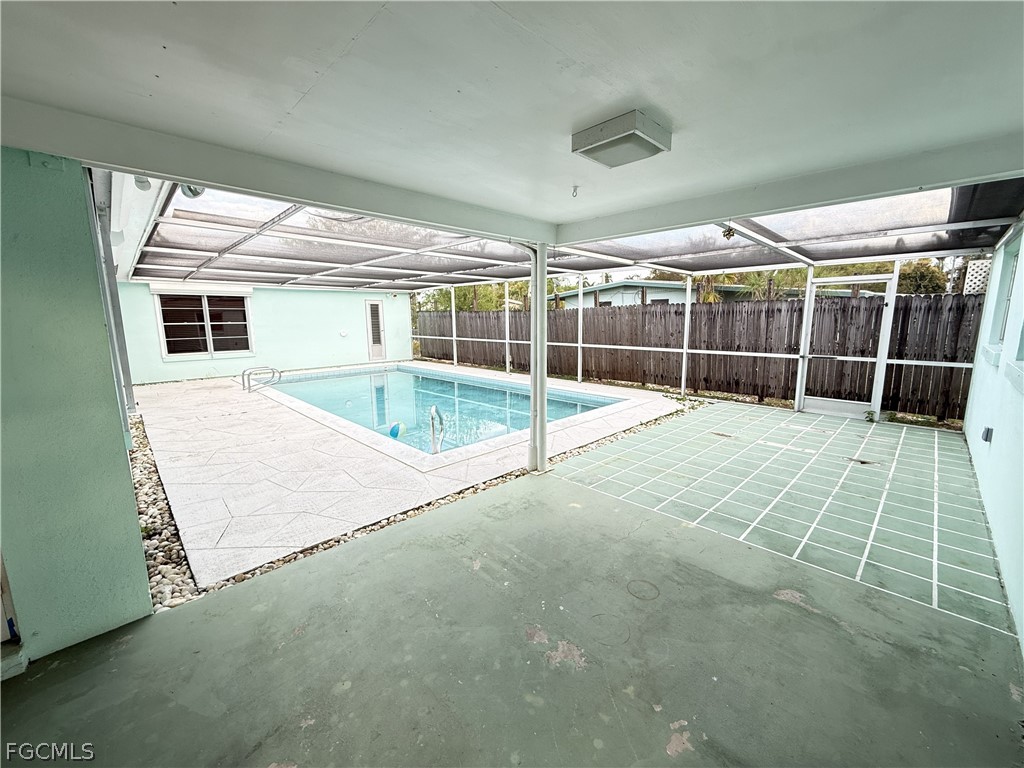 1534 Ricardo Avenue Fort Myers, FL 33901 - Photo 19 of 22 a view of empty room with wooden floor and fan