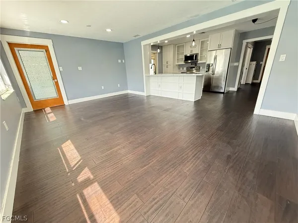 a living room with furniture and a table