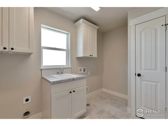 a bathroom with a sink toilet and vanity