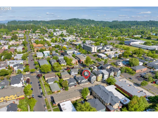 an aerial view of residential house and outdoor space