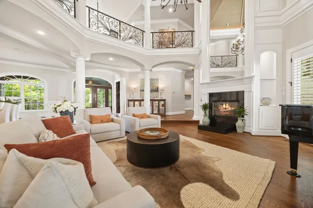 a bathroom with a toilet a sink and a mirror