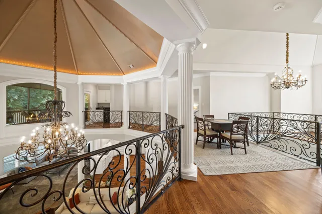 a view of a house with backyard and porch