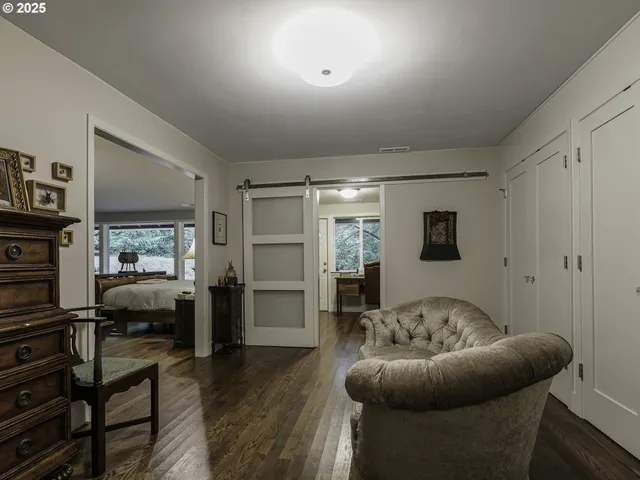 a room with furniture and a wooden floor