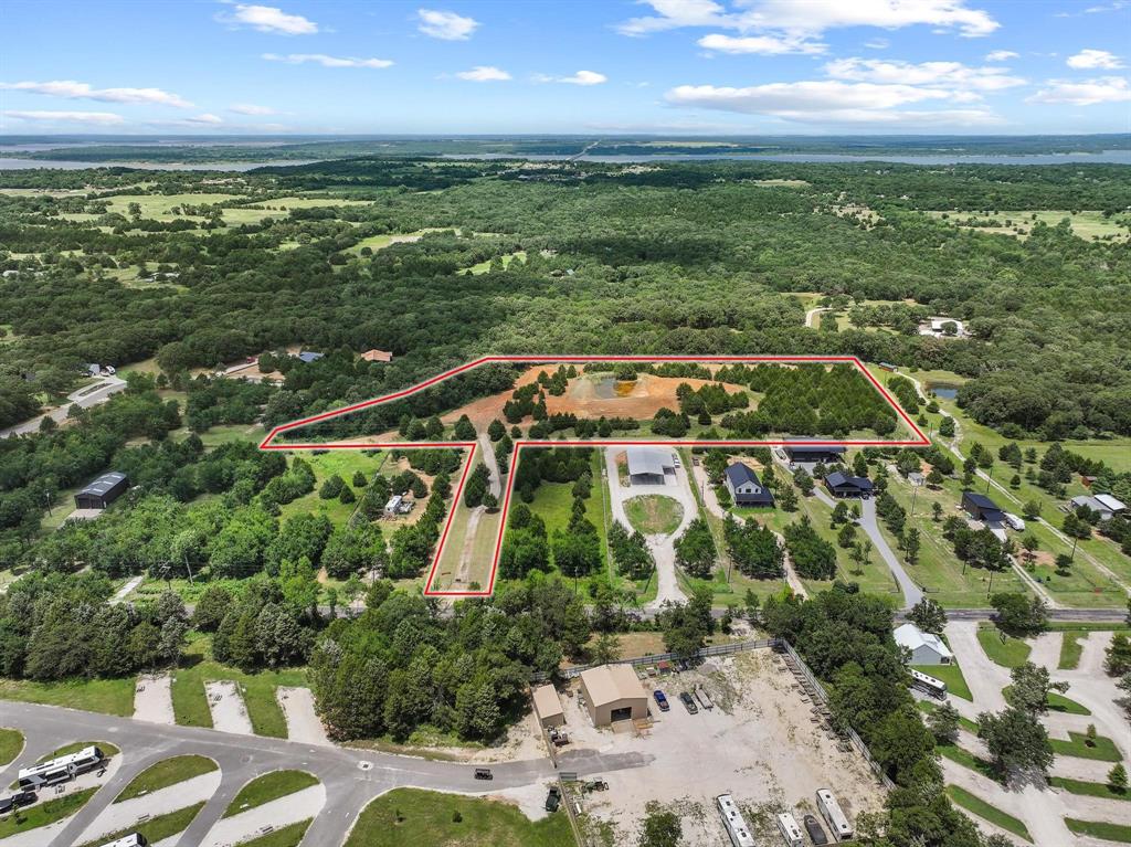 1445 Cedar Mills Road Gordonville, TX 76245 - Photo 24 of 28 Expansive acreage featuring a substantial cleared area, mature trees