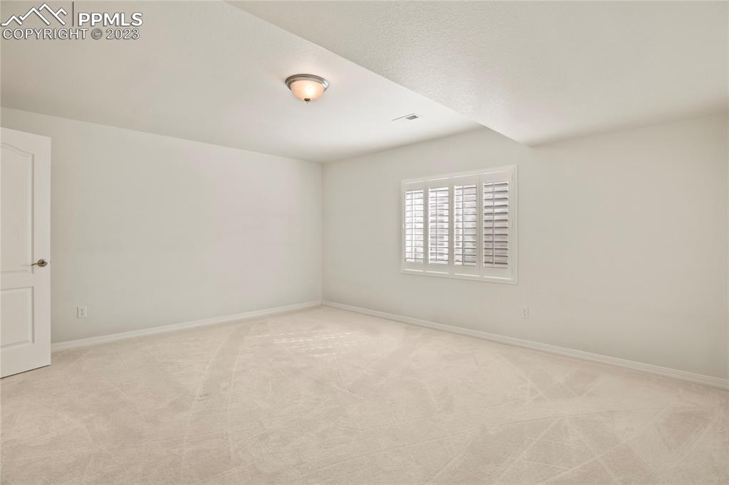 10658 Pictured Rocks Drive Peyton, CO 80831 - Photo 26 of 36 an empty room with windows