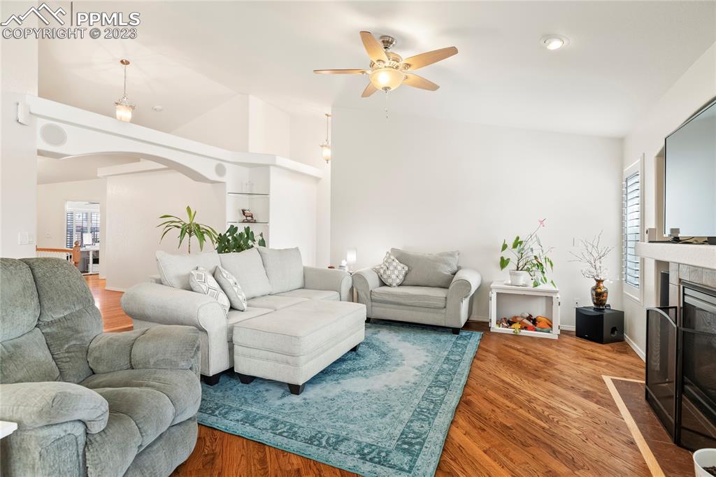 10658 Pictured Rocks Drive Peyton, CO 80831 - Photo 6 of 36 a living room with furniture and a fireplace