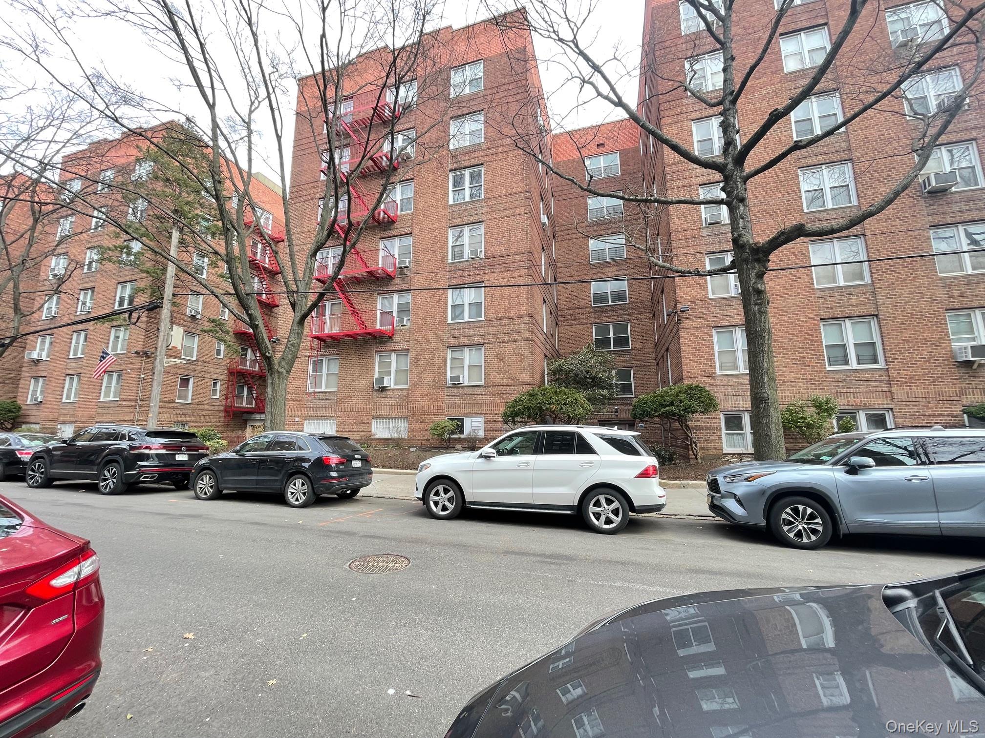 43-35 Union Street, Unit 2M Queens, NY 11355 - Photo 1 of 13 a cars parked in front of a building