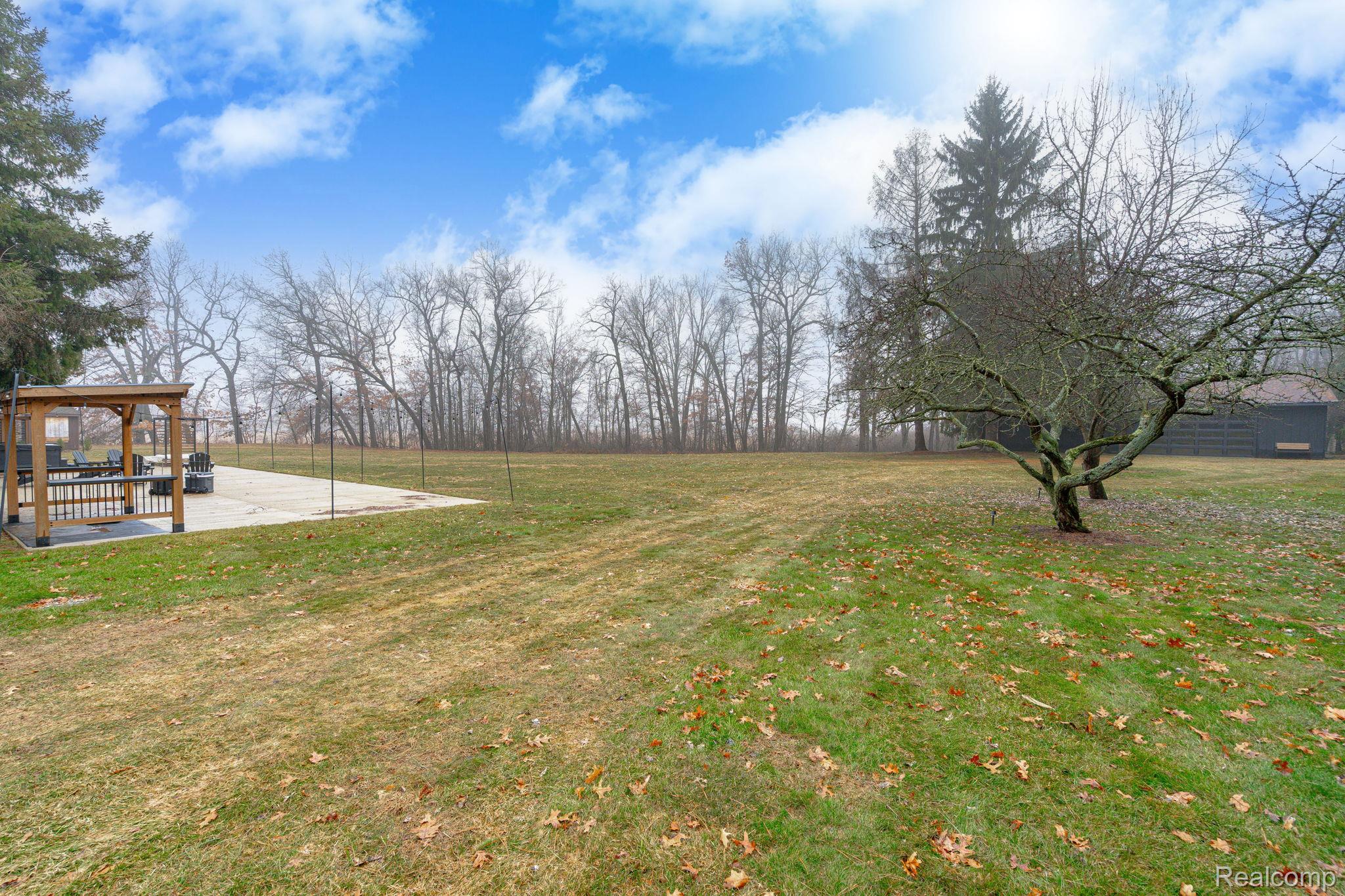 6803 Napoleon Road Jackson, MI 49201 - Photo 11 of 59 Spanning 6 acres of land, this property provides the perfect blend of open space and privacy