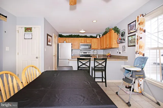 a view of a livingroom with furniture and window