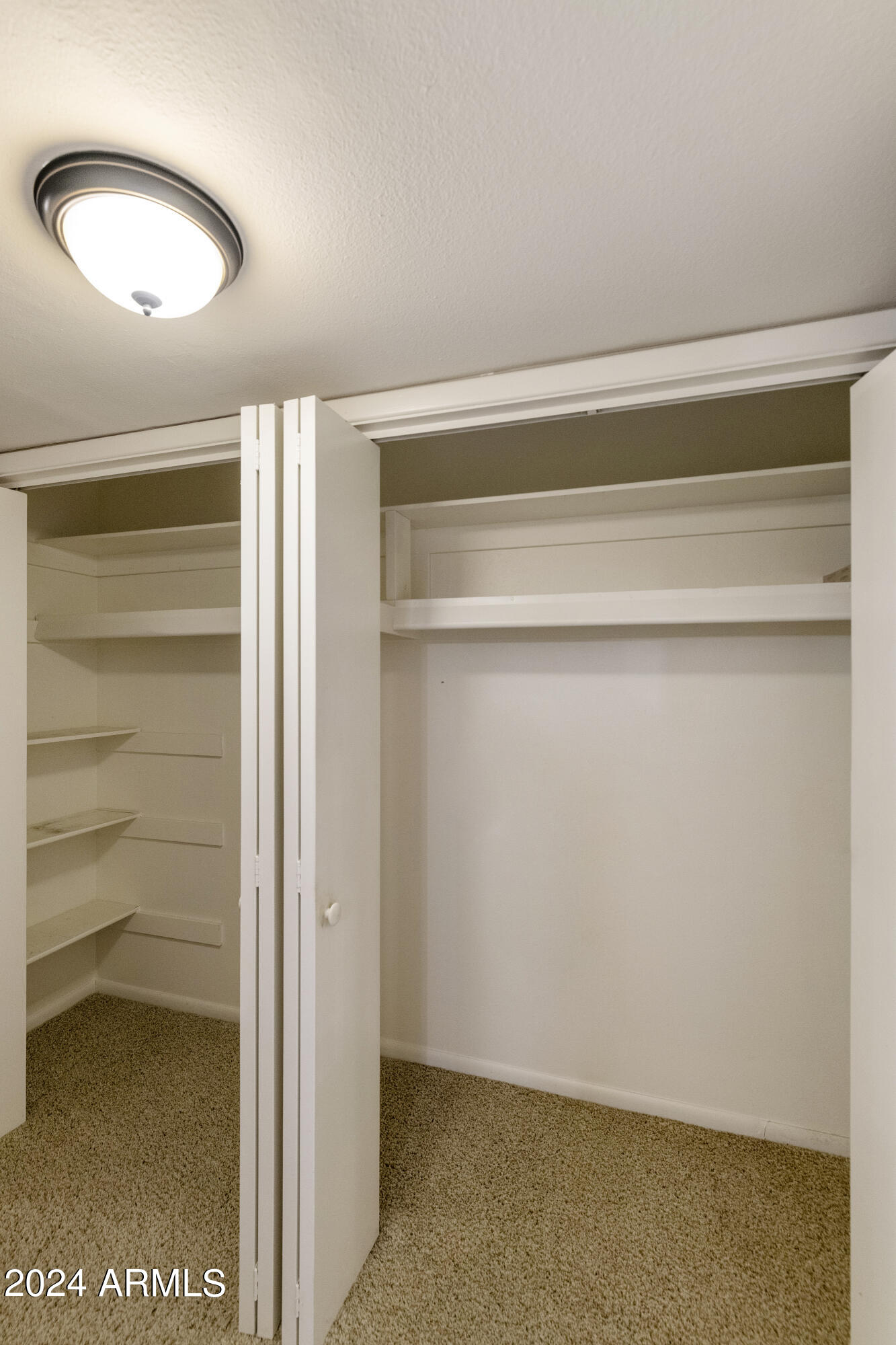 131 North Higley Road, Unit 116 Mesa, AZ 85205 - Photo 16 of 32 116 Primary Bedroom Closets