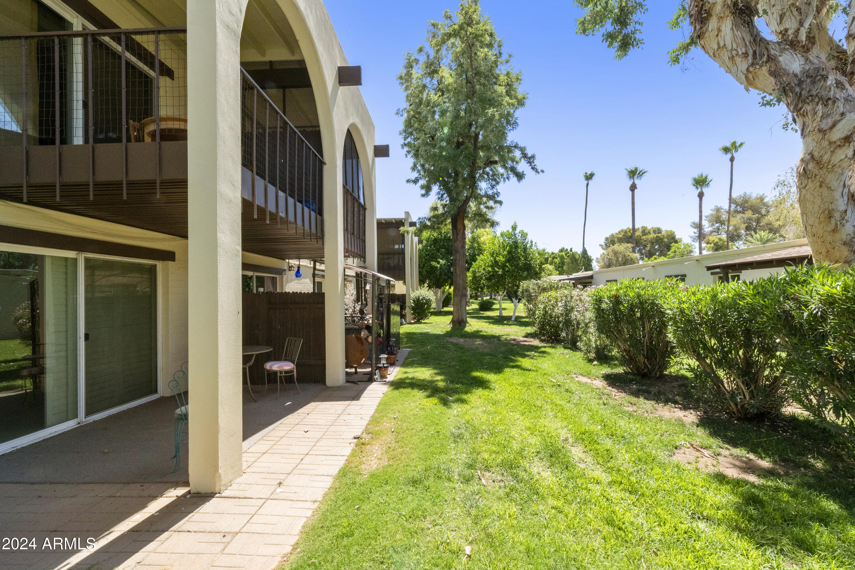 131 North Higley Road, Unit 116 Mesa, AZ 85205 - Photo 22 of 32 116 Back Patio Green space 2