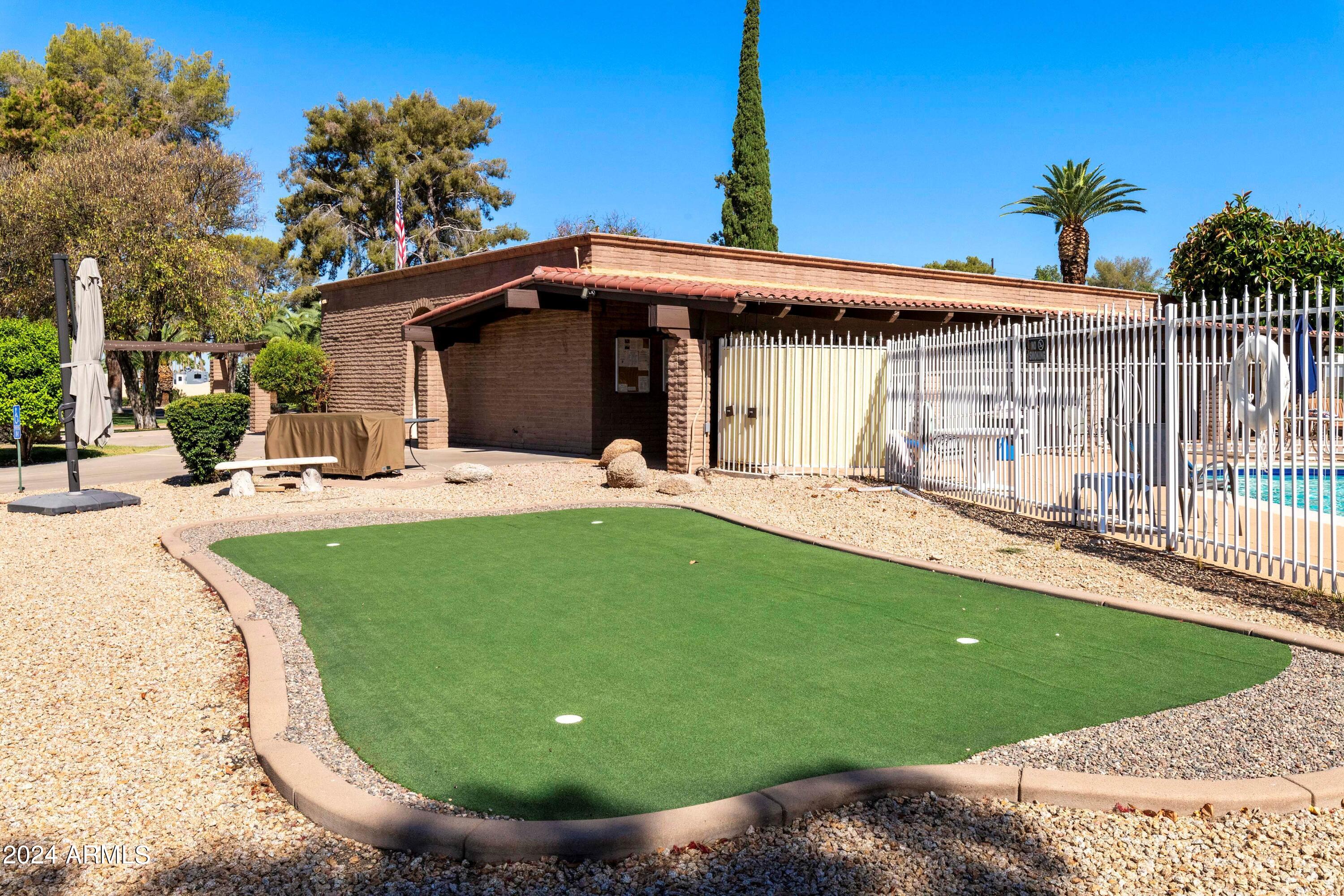 131 North Higley Road, Unit 116 Mesa, AZ 85205 - Photo 28 of 32 Casa de Paz Putting Green