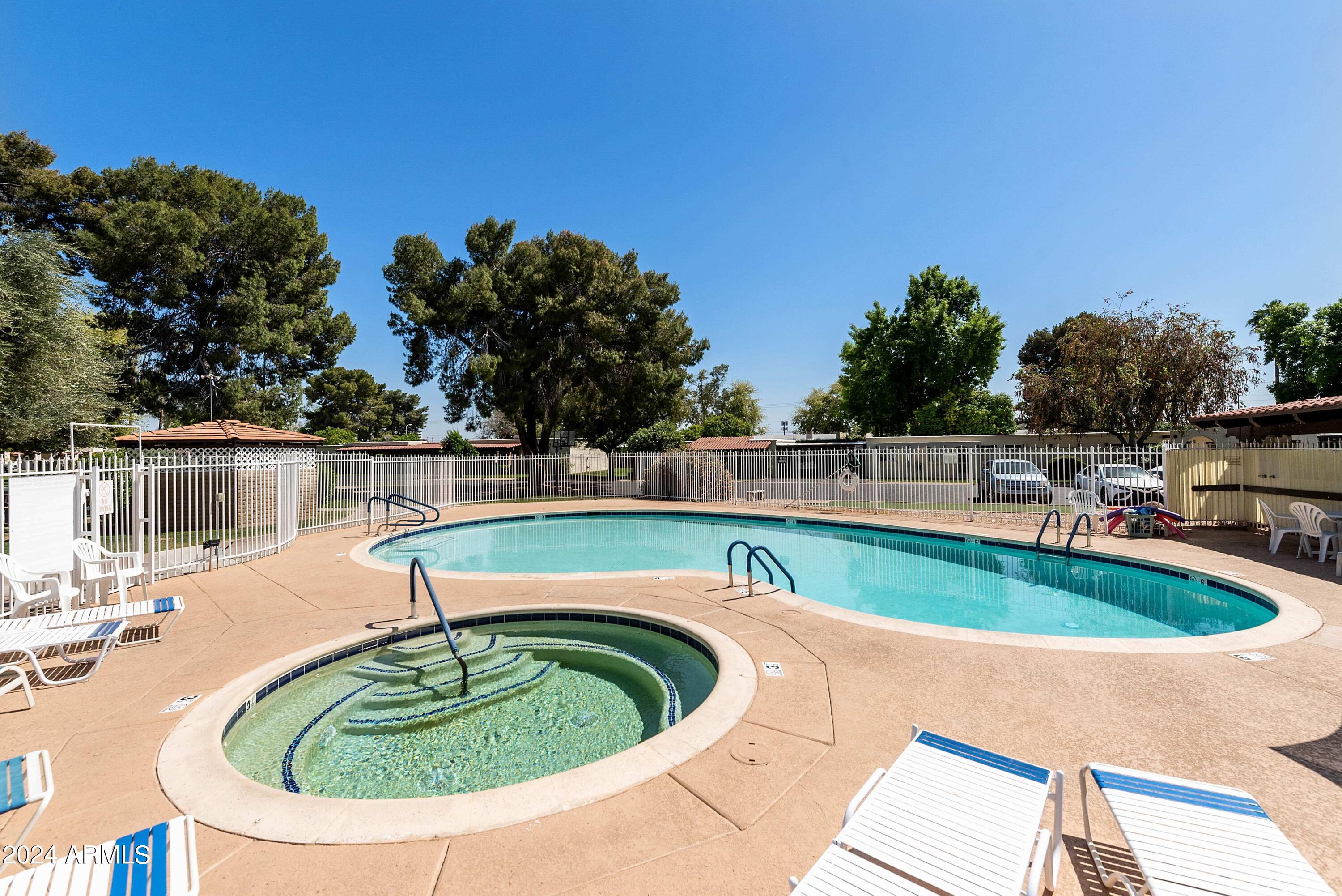 131 North Higley Road, Unit 116 Mesa, AZ 85205 - Photo 29 of 32 Casa de Paz Pool and Spa