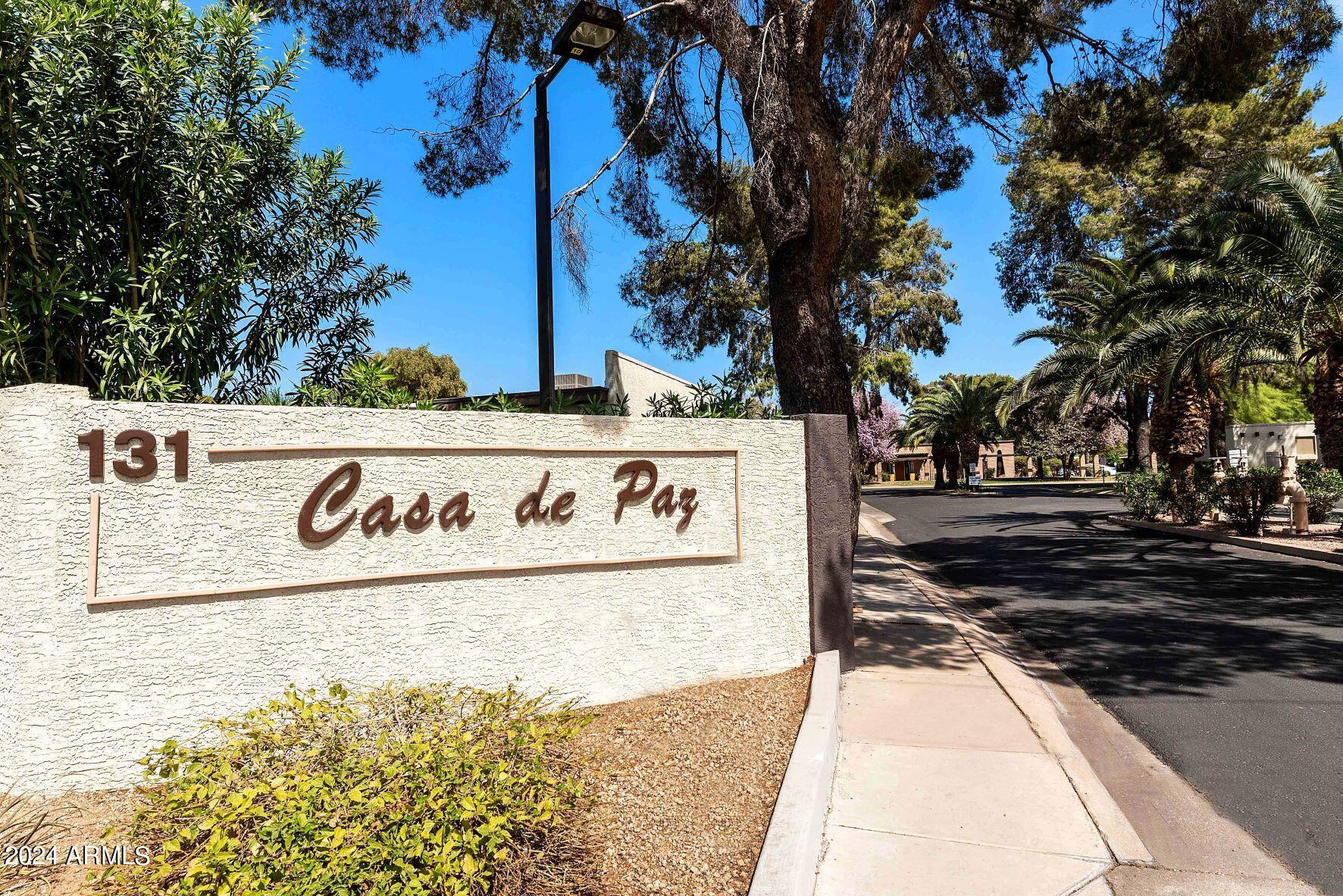 131 North Higley Road, Unit 116 Mesa, AZ 85205 - Photo 32 of 32 Casa de Paz entrance sign